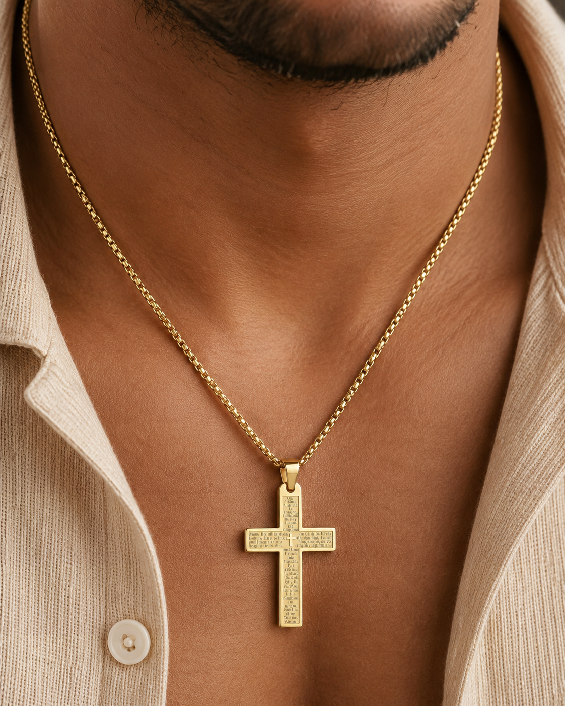 Prayer Armor Cross Chain on a person wearing a beige shirt